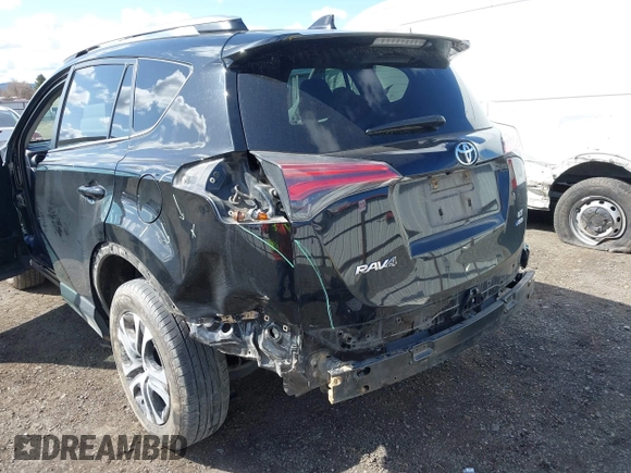 2018 Toyota RAV4 LE with VIN 2T3BFREV2JW749735, listed as a IAAI auction lot 41998068 with 112,468 mi miles. Bid and sale history available at carsss.com. Image 6.