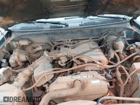 1999 Toyota 4Runner SR5 z VIN JT3HN86R4X0256990, wystawiony jako IAAI lot #41314366 z przebiegiem 362 268 mil mil oraz . Historia ofert i sprzedaży dostępna na DreamBid. Obrazek 10.