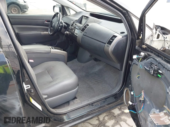 2007 Toyota Prius with VIN JTDKB20U977660315, listed as a IAAI auction lot 42097560 with 158,187 mi miles. Bid and sale history available at carsss.com. Image 5.
