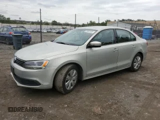 2011 Volkswagen Jetta SE z VIN 3VWDX7AJ2BM323623, wystawiony jako Copart lot #59057335 z przebiegiem 99 398 mil mil oraz Szkoda całkowita • Salvage title. Historia ofert i sprzedaży dostępna na DreamBid. Obrazek 1.