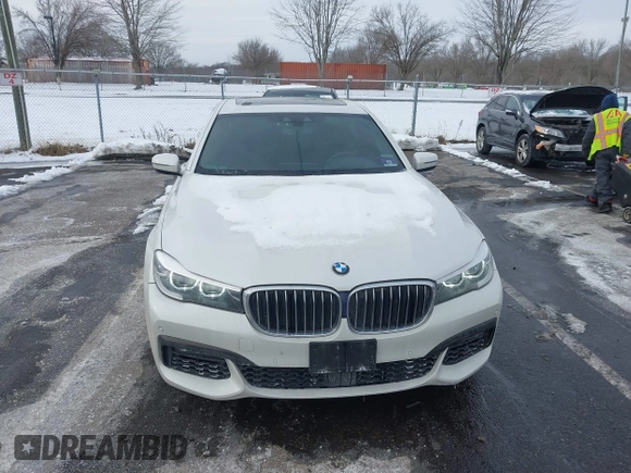 2018 BMW 7 Series 740i xDrive with VIN WBA7E4C59JGV23876, listed as a IAAI auction lot 41381398 with 106,675 mi miles. Bid and sale history available at carsss.com. Image 12.