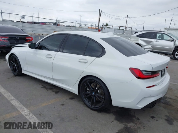 2021 BMW 3 Series 330i z VIN 3MW5R1J04M8C06043, wystawiony jako IAAI lot #42109872 z przebiegiem 62 325 mil mil oraz . Historia ofert i sprzedaży dostępna na DreamBid. Obrazek 3.