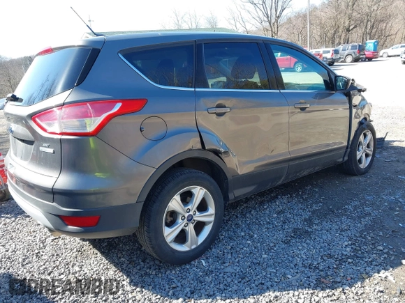 2014 Ford Escape SE z VIN 1FMCU0G99EUB25967, wystawiony jako IAAI lot #41805970 z przebiegiem 72 770 mil mil oraz . Historia ofert i sprzedaży dostępna na DreamBid. Obrazek 4.