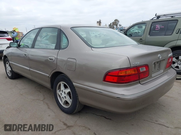 1998 Toyota Avalon XL with VIN 4T1BF18B5WU274472, listed as a IAAI auction lot 42188432 with 250,360 mi miles and . Bid and sale history available at DreamBid. Image 3.