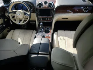 2017 Bentley Bentayga W12 z VIN SJAAC2ZV1HC014037, wystawiony jako Copart lot #73797634 z przebiegiem Nie podano mil oraz Szkoda całkowita • Salvage title. Historia ofert i sprzedaży dostępna na DreamBid. Obrazek 8.