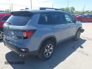 2022 Honda Passport TrailSport with VIN 5FNYF8H6XNB023013, listed as a IAAI auction lot 42274071 with 31,471 mi miles and . Bid and sale history available at DreamBid. Image 4.