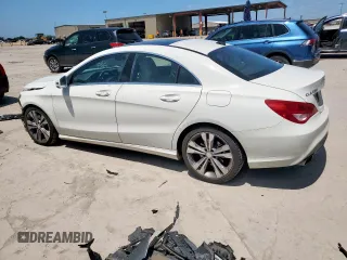 2014 Mercedes-Benz CLA 250 with VIN WDDSJ4EB8EN040382, listed as a Copart auction lot 61055185 with 76,380 mi miles and Salvage title. Bid and sale history available at DreamBid. Image 2.