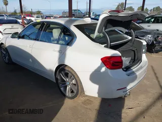 2016 BMW 3 Series 328i with VIN WBA8E9G58GNT47869, listed as a IAAI auction lot 41594120 with 57,561 mi miles. Bid and sale history available at carsss.com. Image 3.