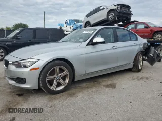 2014 BMW 3 Series 320i with VIN WBA3B1C51EP680412, listed as a Copart auction lot 63587815 with 88,097 mi miles and Clean title. Bid and sale history available at DreamBid. Image 1.