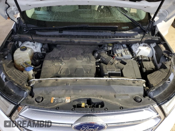 2015 Ford Edge Titanium z VIN 2FMTK4K80FBB73022, wystawiony jako Copart lot #53654035 z przebiegiem 155 848 mil mil oraz Szkoda całkowita • Salvage title. Historia ofert i sprzedaży dostępna na DreamBid. Obrazek 12.