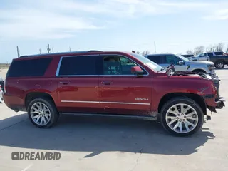 2020 GMC Yukon XL Denali with VIN 1GKS1HKJ3LR238701, listed as a IAAI auction lot 41724274 with 107,323 mi miles and . Bid and sale history available at DreamBid. Image 13.