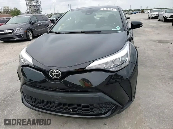 2021 Toyota C-HR LE with VIN JTNKHMBX7M1128976, listed as a Copart auction lot 54297035 with Not Provided miles and Salvage Title. Bid and sale history available at DreamBid. Image 14.