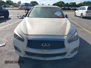 2014 Infiniti Q50 Sport with VIN JN1BV7AR7EM699663, listed as a IAAI auction lot 41532264 with 124,701 mi miles and . Bid and sale history available at DreamBid. Image 6.