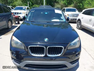 2014 BMW X1 sDrive28i with VIN WBAVM1C5XEVW51666, listed as a IAAI auction lot 42083936 with 176,465 mi miles. Bid and sale history available at carsss.com. Image 6.
