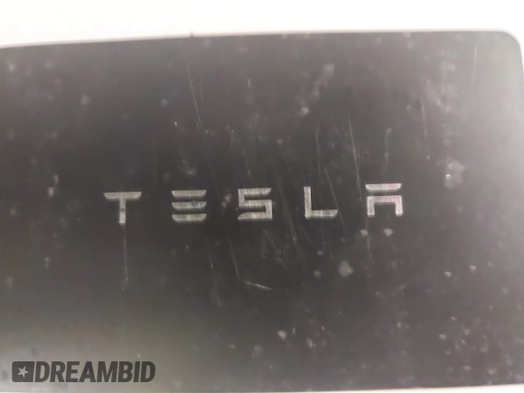 2022 Tesla Model S with VIN 5YJSA1E50NF487306, listed as a IAAI auction lot 41570528 with Not Provided miles and . Bid and sale history available at DreamBid. Image 11.