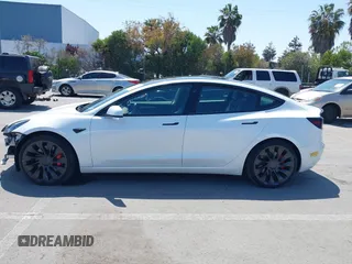 2022 Tesla Model 3 Performance with VIN 5YJ3E1ECXNF270238, listed as a IAAI auction lot 42173668 with 13,017 mi miles and . Bid and sale history available at DreamBid. Image 15.