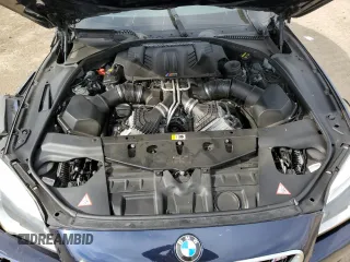 2016 BMW M6 z VIN WBS6G9C5XGD932039, wystawiony jako Copart lot #47433685 z przebiegiem 66 836 mil mil oraz Szkoda całkowita • Salvage title. Historia ofert i sprzedaży dostępna na DreamBid. Obrazek 11.