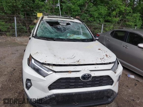 2022 Toyota RAV4 XLE Premium z VIN 2T3A1RFV1NW312419, wystawiony jako IAAI lot #42361686 z przebiegiem 14 291 mil mil oraz . Historia ofert i sprzedaży dostępna na DreamBid. Obrazek 12.
