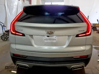 2022 Cadillac XT4 FWD Premium Luxury with VIN 1GYFZCR47NF100232, listed as a Copart auction lot 54520405 with 68,819 mi miles and Clean title. Bid and sale history available at DreamBid. Image 6.