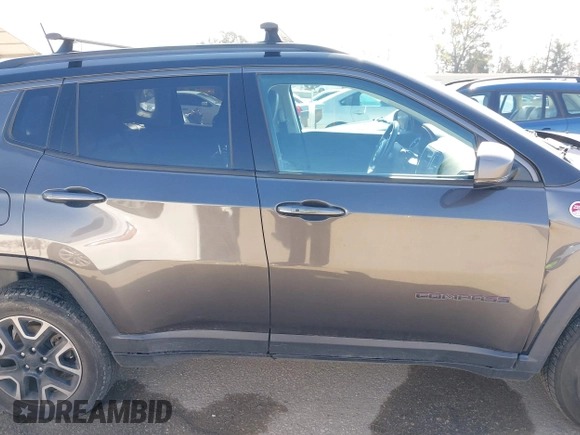 2019 Jeep Compass Trailhawk with VIN 3C4NJDDB3KT759849, listed as a IAAI auction lot 42141467 with 100,915 mi miles and . Bid and sale history available at DreamBid. Image 13.