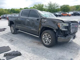 2019 GMC Sierra 1500 Denali z VIN 1GTU9FEL8KZ180128, wystawiony jako IAAI lot #42028488 z przebiegiem 78 015 mil mil oraz . Historia ofert i sprzedaży dostępna na DreamBid. Obrazek 1.