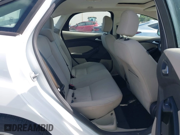 2015 Ford Focus SE with VIN 1FADP3F23FL329375, listed as a IAAI auction lot 42170945 with 114,180 mi miles. Bid and sale history available at carsss.com. Image 8.