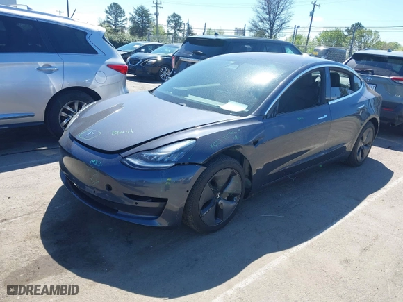 2018 Tesla Model 3 Long Range Battery with VIN 5YJ3E1EB5JF119146, listed as a IAAI auction lot 41807331 with 40,571 mi miles. Bid and sale history available at carsss.com. Image 21.
