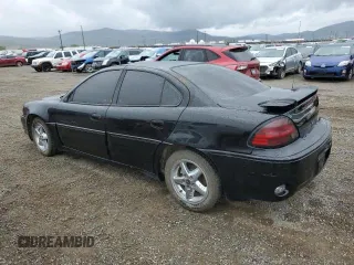 2000 Pontiac Grand Am GT1 with VIN 1G2NV52E1YM822599, listed as a Copart auction lot 42972085 with 0 mi miles and Clean Title. Bid and sale history available at carsss.com. Image 2.