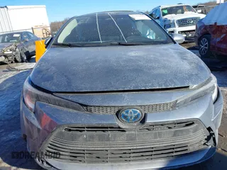 2023 Toyota Corolla Hybrid LE with VIN JTDBCMFE2P3007258, listed as a IAAI auction lot 41416080 with 12,517 mi miles. Bid and sale history available at carsss.com. Image 12.