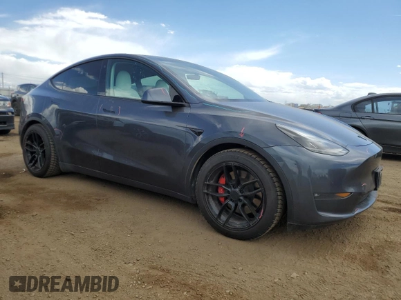 2021 Tesla Model Y Performance with VIN 5YJYGDEF0MF137692, listed as a Copart auction lot 55333395 with 56,325 mi miles and Salvage Title. Bid and sale history available at DreamBid. Image 4.
