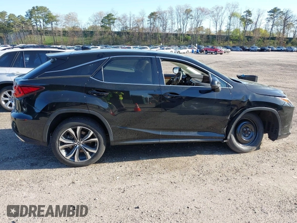 2019 Lexus RX with VIN 2T2BZMCA3KC193615, listed as a IAAI auction lot 42097232 with 33,797 mi miles. Bid and sale history available at carsss.com. Image 13.