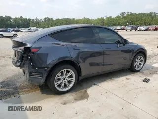 2024 Tesla Model Y Long Range with VIN 7SAYGDEE0RA255613, listed as a Copart auction lot 58993085 with 39,336 mi miles and Salvage title. Bid and sale history available at DreamBid. Image 3.
