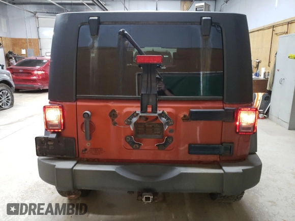 2009 Jeep Wrangler Unlimited X с VIN 1J8GA39139L788480, выставлен на аукционе Copart как лот 63013635 с пробегом 166 007 миль миль и Чистый • Clean title. История ставок и продаж доступна на DreamBid. Изображение 6.