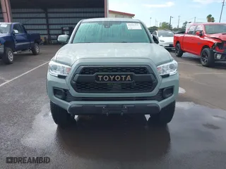 2022 Toyota Tacoma 4WD SR with VIN 3TYCZ5AN7NT065270, listed as a IAAI auction lot 41506454 with 13,097 mi miles. Bid and sale history available at carsss.com. Image 12.
