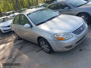 2009 Kia Spectra EX with VIN KNAFE221695647240, listed as a IAAI auction lot 41994191 with 237,101 mi miles. Bid and sale history available at carsss.com. Image 1.
