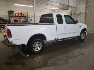 1999 Ford F-150 XL with VIN 2FTRX18L1XCA22096, listed as a Copart auction lot 52402885 with 120,254 mi miles and Salvage Title. Bid and sale history available at carsss.com. Image 3.