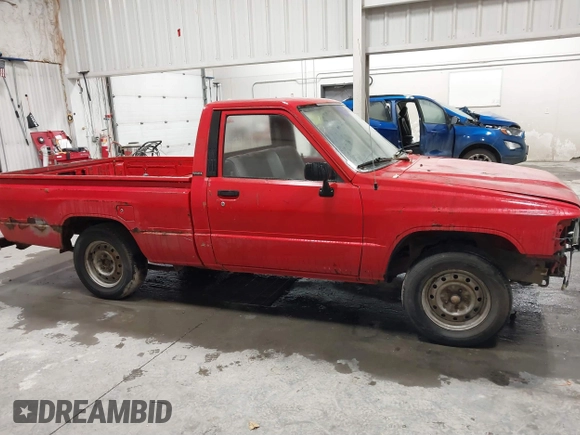 1987 Toyota Pickup with VIN JT4RN50R8H0221202, listed as a IAAI auction lot 40500429 with 304,229 mi miles and . Bid and sale history available at DreamBid. Image 13.