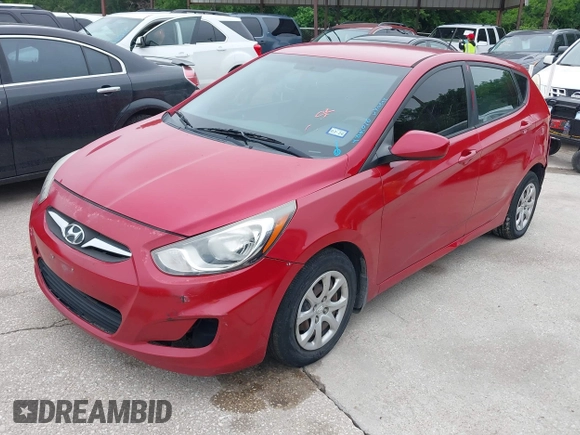 2014 Hyundai Accent GS with VIN KMHCT5AE1EU172027, listed as a IAAI auction lot 42165016 with 140,943 mi miles and . Bid and sale history available at carsss.com. Image 2.