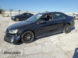 2012 Volkswagen Jetta GLI z VIN 3VW467AJ6CM372098, wystawiony jako Copart lot #75258104 z przebiegiem 91 377 mil mil oraz Szkoda całkowita • Salvage title. Historia ofert i sprzedaży dostępna na DreamBid. Obrazek 1.