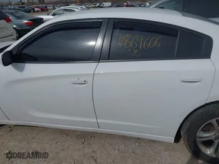2015 Dodge Charger SE with VIN 2C3CDXBGXFH812015, listed as a IAAI auction lot 41869666 with 108,823 mi miles. Bid and sale history available at carsss.com. Image 14.