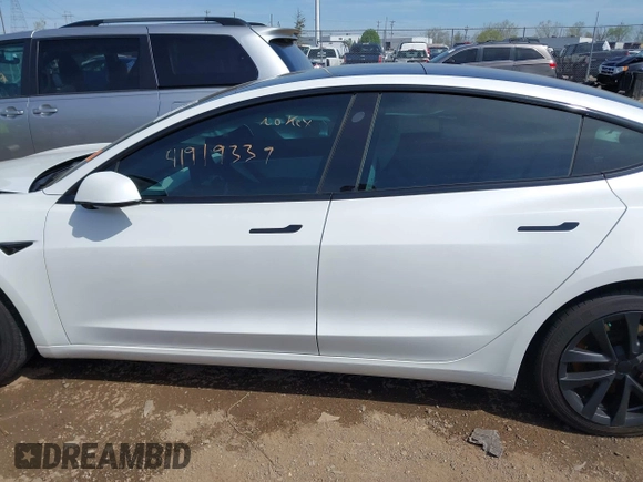 2020 Tesla Model 3 Standard Range Plus with VIN 5YJ3E1EA3LF785951, listed as a IAAI auction lot 41919339 with 63,025 mi miles and . Bid and sale history available at carsss.com. Image 13.