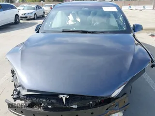 2019 Tesla Model X 75D with VIN 5YJXCBE23KF183801, listed as a IAAI auction lot 41757119 with Not Provided miles and . Bid and sale history available at carsss.com. Image 10.