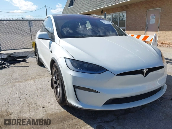 2023 Tesla Model X Plaid with VIN 7SAXCBE63PF405105, listed as a IAAI auction lot 41876918 with 22,475 mi miles and . Bid and sale history available at DreamBid. Image 1.