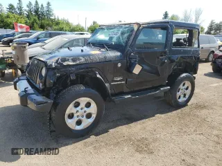 2014 Jeep Wrangler Sahara с VIN 1C4AJWBG1EL247273, выставлен на аукционе Copart как лот 57244085 с пробегом Не указан миль и Списание • Salvage title. История ставок и продаж доступна на DreamBid. Изображение 1.
