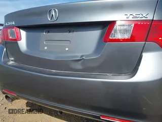 2009 Acura TSX z VIN JH4CU26629C010046, wystawiony jako IAAI lot #42303097 z przebiegiem 157 720 mil mil oraz . Historia ofert i sprzedaży dostępna na DreamBid. Obrazek 6.