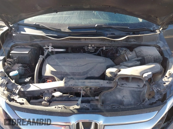 2019 Honda Odyssey LX with VIN 5FNRL6H21KB057139, listed as a IAAI auction lot 41422185 with 128,812 mi miles and . Bid and sale history available at DreamBid. Image 10.