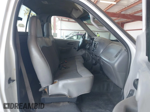 1999 Ford F-150 with VIN 1FTZF1721XKB63483, listed as a IAAI auction lot 42327278 with Not provided miles and . Bid and sale history available at DreamBid. Image 5.