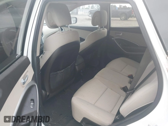 2016 Hyundai Santa Fe z VIN 5XYZU3LB0GG345673, wystawiony jako IAAI lot #42290297 z przebiegiem 75 701 mil mil oraz . Historia ofert i sprzedaży dostępna na DreamBid. Obrazek 19.