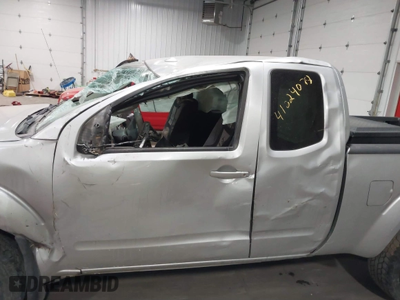 2015 Nissan Frontier SV with VIN 1N6AD0CW4FN751068, listed as a IAAI auction lot 41024078 with 900,000 mi miles and . Bid and sale history available at DreamBid. Image 14.