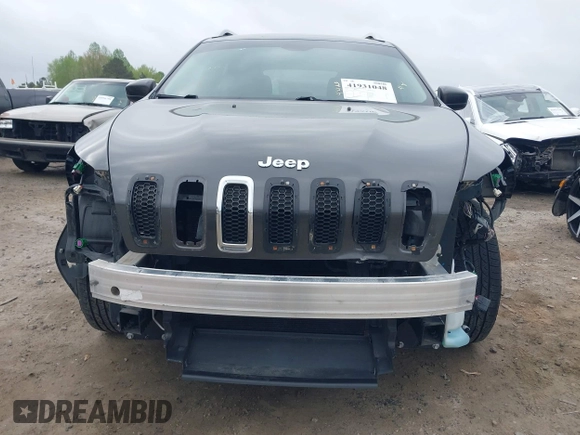 2015 Jeep Cherokee Latitude with VIN 1C4PJLCB0FW601862, listed as a IAAI auction lot 41931048 with 100,705 mi miles and . Bid and sale history available at DreamBid. Image 6.